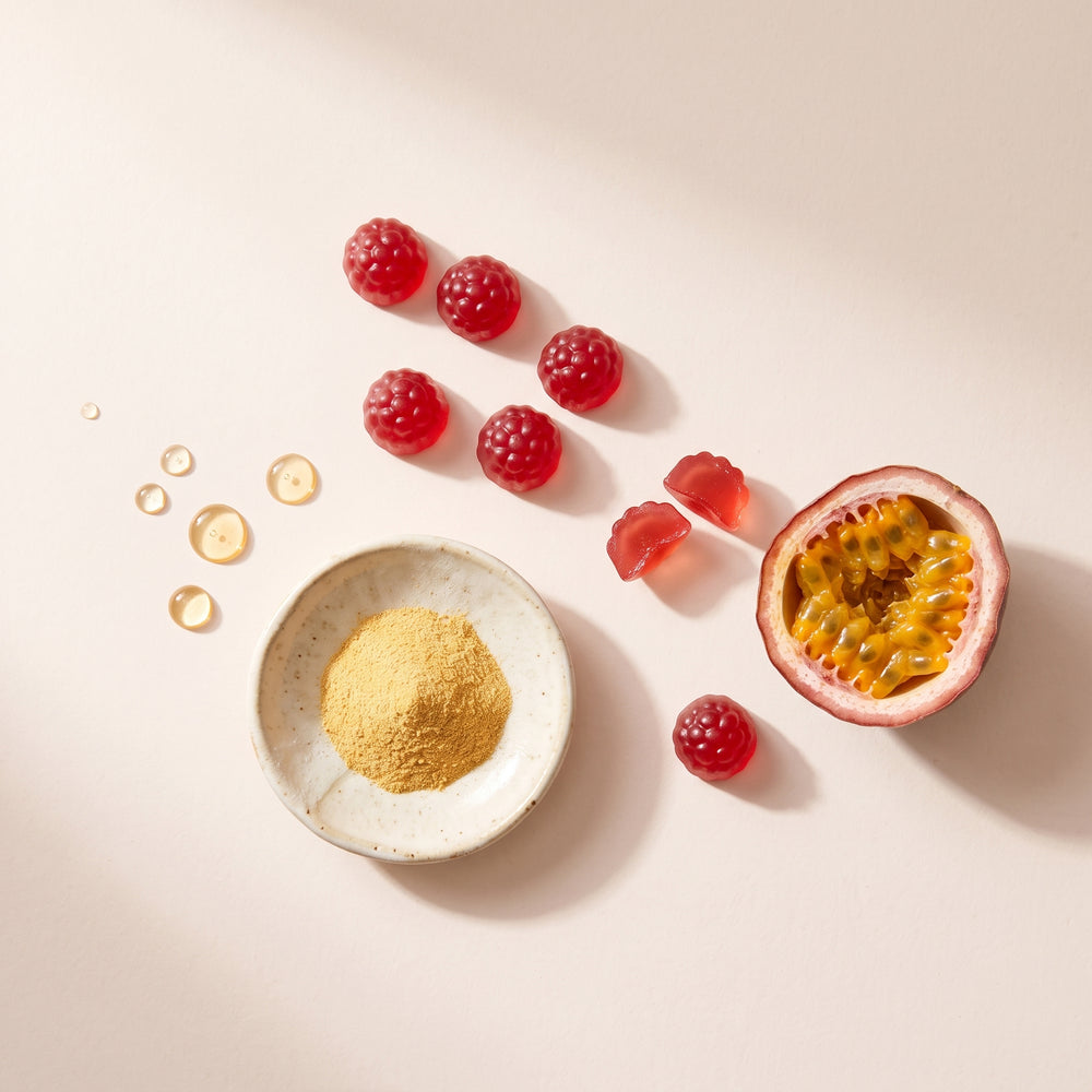 Close-up of a red passion fruit gummy — the Gummy & Co. hair, skin and nails formula